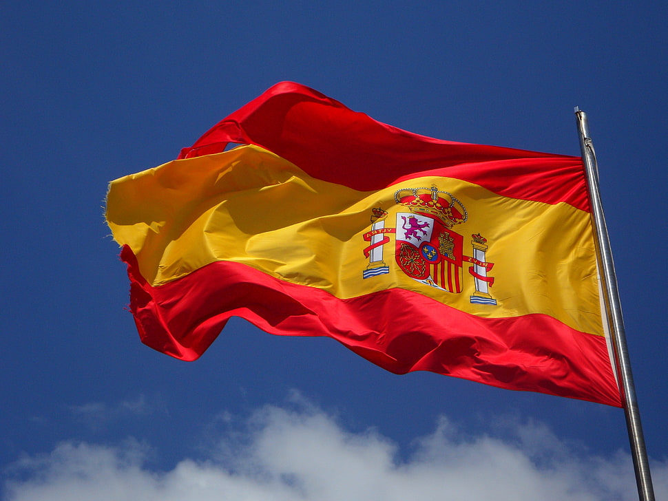 red and yellow coat-printed flag HD wallpaper