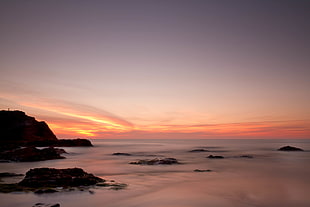 landscape photo of coastal rocks during golden hour