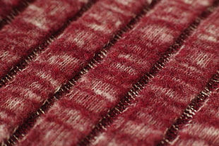close up photography of red textile