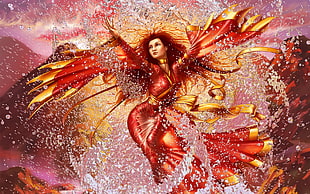 woman with red hair and red dress splashing the water