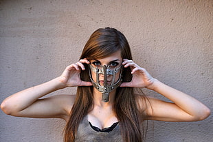 woman wearing gray steel mask