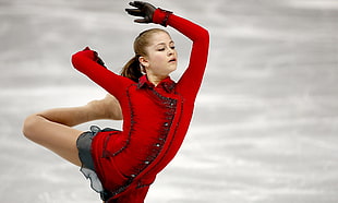 figure skater wearing glittered red and black long-sleeved costume HD wallpaper