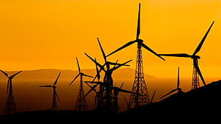 windmills during sunset