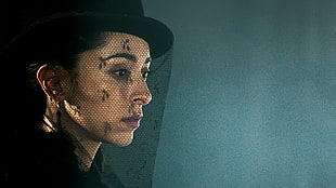 closeup photo of woman wearing hat and black top HD wallpaper