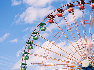 gray, red, and green ferris wheel
