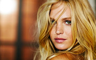 shallow focus on blond haired woman with green eyes HD wallpaper