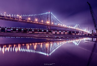 lighted bridge at night HD wallpaper