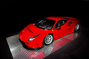 red Ferrari sports car scale model