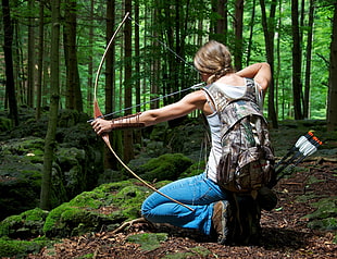 woman holding composite bow HD wallpaper