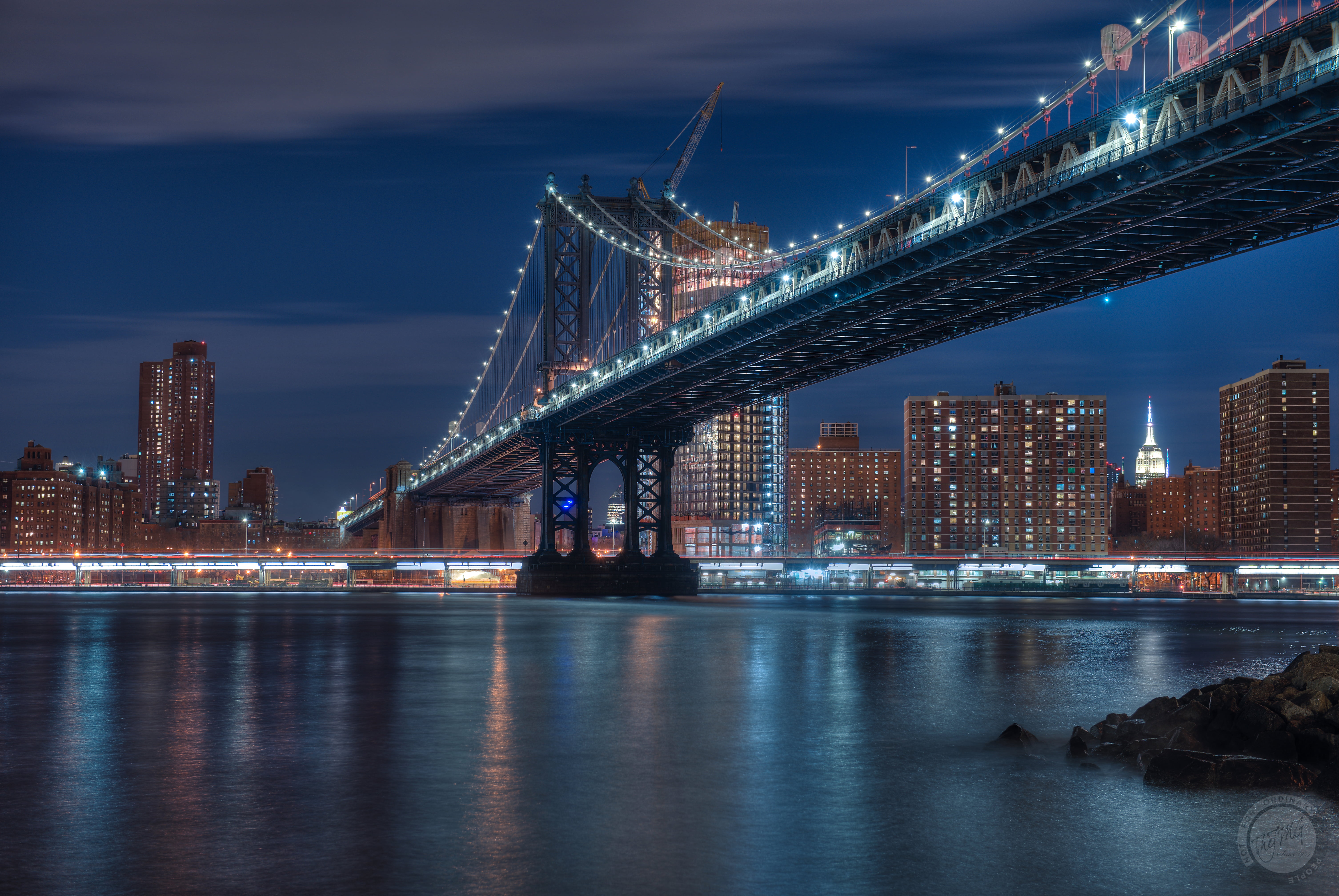 painting of Manhattan Bridge with lights during nighttime