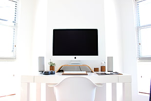 silver iMac setup on white wooden table HD wallpaper
