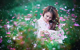 woman wearing white and pink floral kimono white on flower field