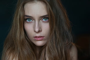 woman with blonde hair and green eyes