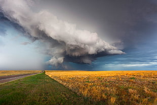 gray cloudy skies, supercell (nature), field, road, storm HD wallpaper