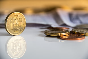 selective focus photography of 10 Kronor coin on white table