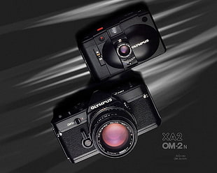 close up photo of black Olympus SLR camera