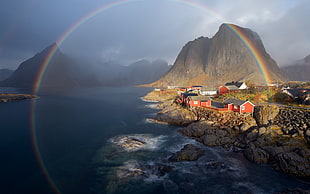 village near mountain and ocean with rainbow in between, nature, landscape, water, trees