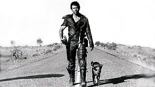 grayscale portrait of man with dog, Mad Max, Mel Gibson, 1980s
