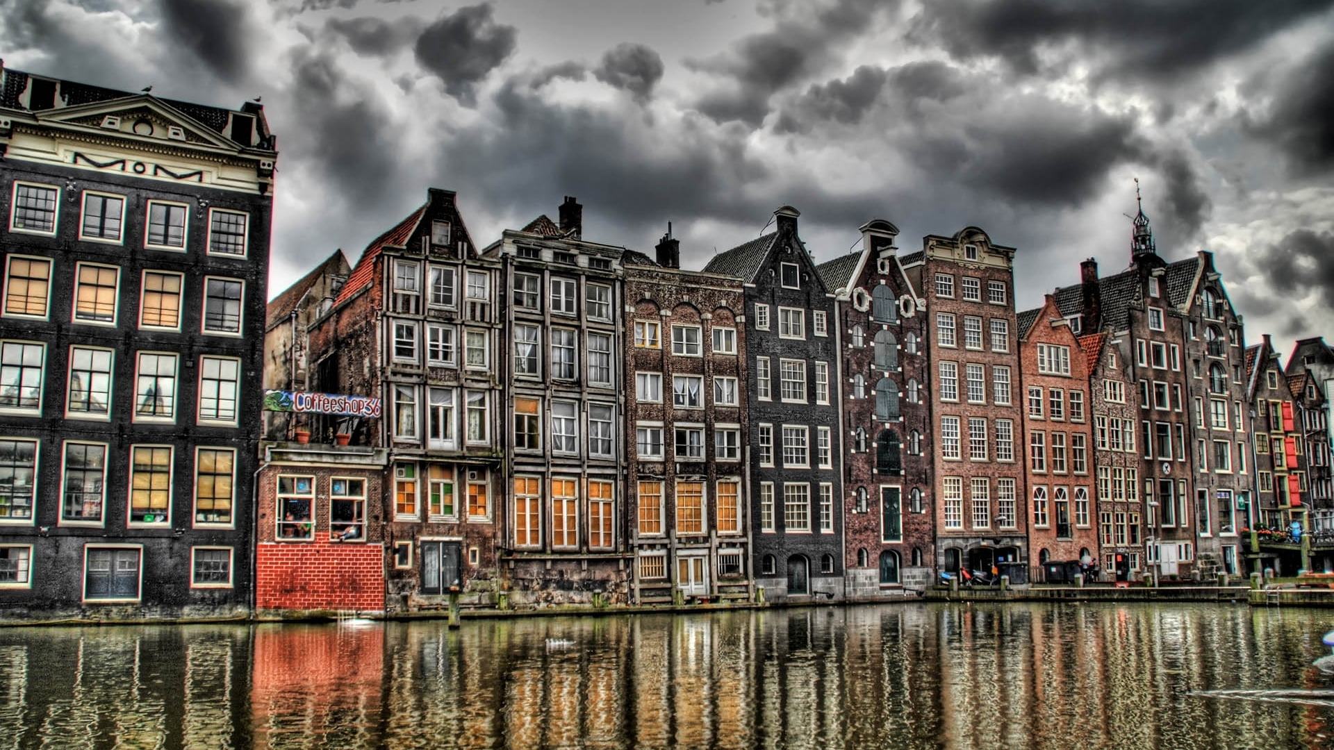 panoramic photography of high rise building near lake