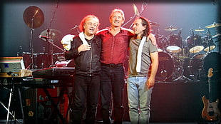 three musicians surrounded my musical instruments HD wallpaper