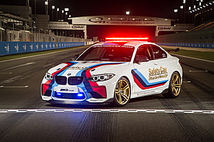 white, blue, and red BMW car graphics