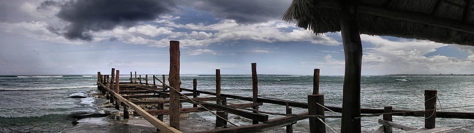 brown wooden pier, multiple display, beach, storm HD wallpaper