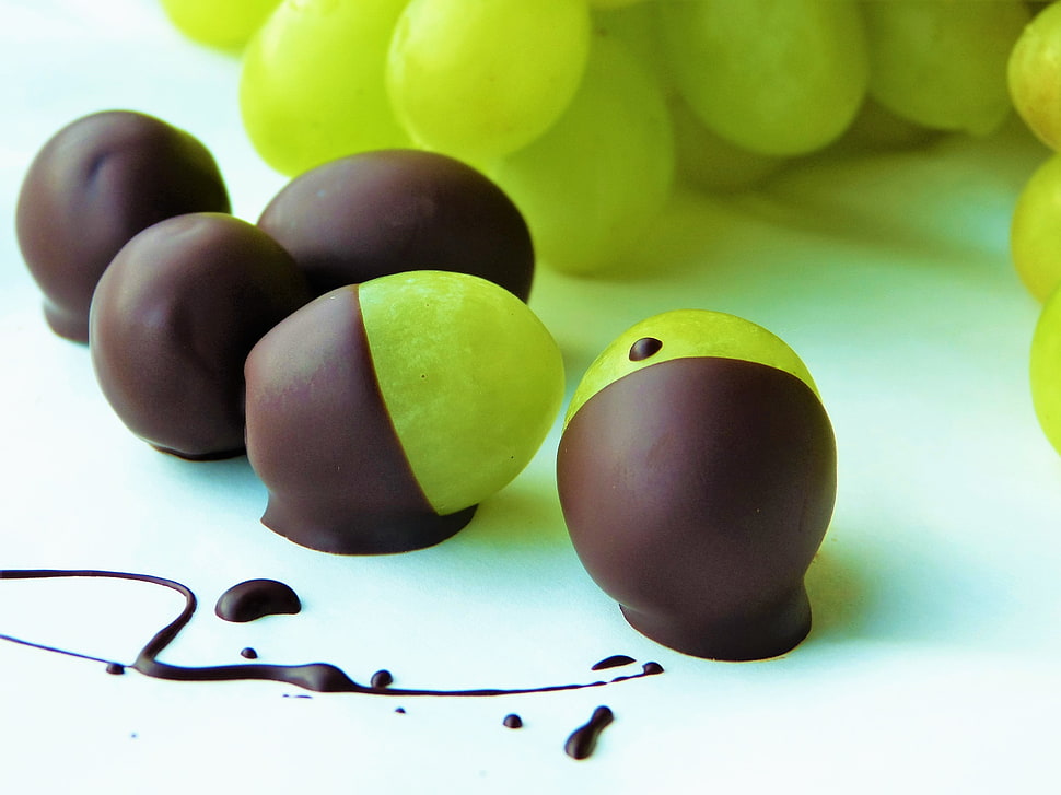 oval brown-and-green chocolates HD wallpaper