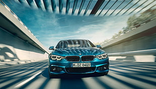 time lapse photography of blue BMW car HD wallpaper
