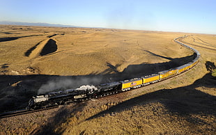 yellow and black train on desert, train, steam locomotive, diesel locomotive, transport