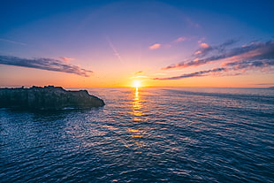 panoramic photography of island during sunset