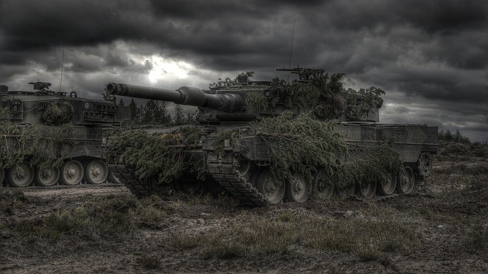 two mirage tanks during rainy day HD wallpaper