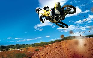 man riding in black and white dirt motocross during daytime HD wallpaper