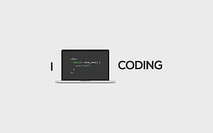 white and black laptop computer with Coding text overlay