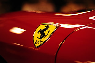close up photo of Ferrari emblem HD wallpaper