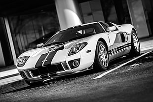 grayscale photography of Ford GT on pavement HD wallpaper
