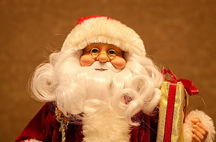 Santa Claus doll wearing eye spectacles HD wallpaper