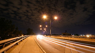 time lapse photo of road during nighttime