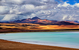 teal body of water and brown hills, nature, landscape, lake, mountains