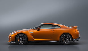 orange Chevrolet Corvette sports coupe