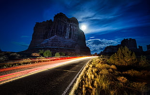 gray asphalt road surrounded by brown grass under blue sky during nighttime, night, road, Utah, USA