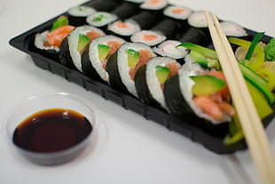 sushi on black tray