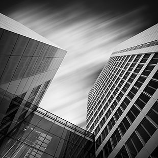 high rise building in grayscale photo