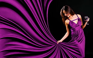 woman wearing purple sleeveless dress