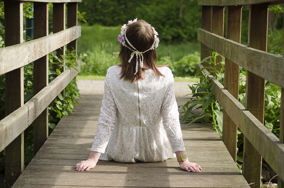 woman wearing white lace dress sitting on wooden bridge HD wallpaper