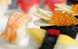 tilt photography of sushi and gimbap