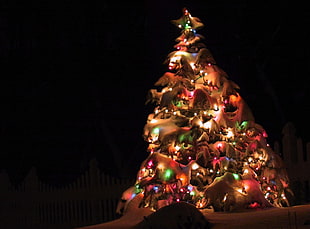 white christmas tree full of string lights