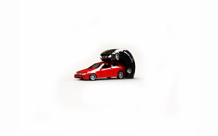 black car on top of red car, white background, red cars, minimalism, black cars