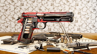 black and red semi-automatic pistol