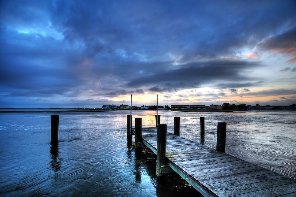 low texture photography of boat dock under nimbus clouds and blue calm sky HD wallpaper
