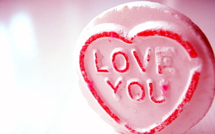 selective focus photography of love you decor